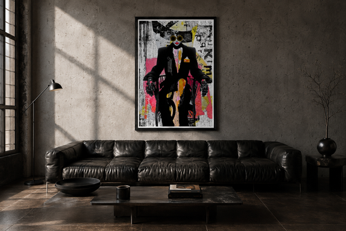 Boss Lady framed above a black sofa in a concrete loft